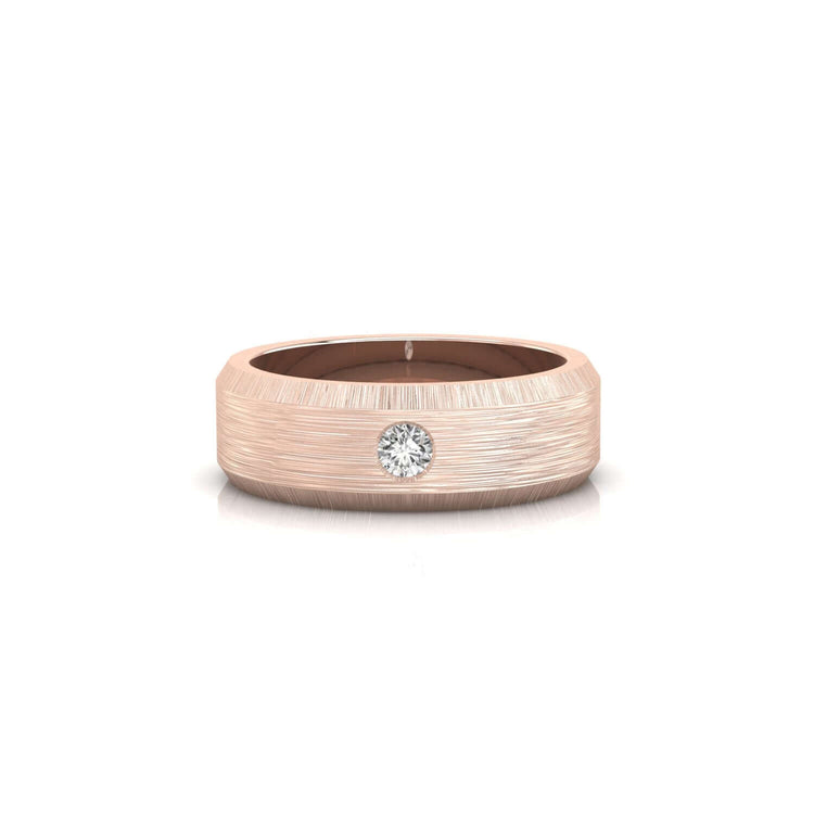 Rose gold men’s wedding band with flush set diamond.
