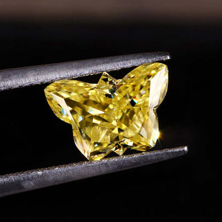 Antique Butterfly Cut Yellow Moissanite loose stone in 2.10 carat size.
