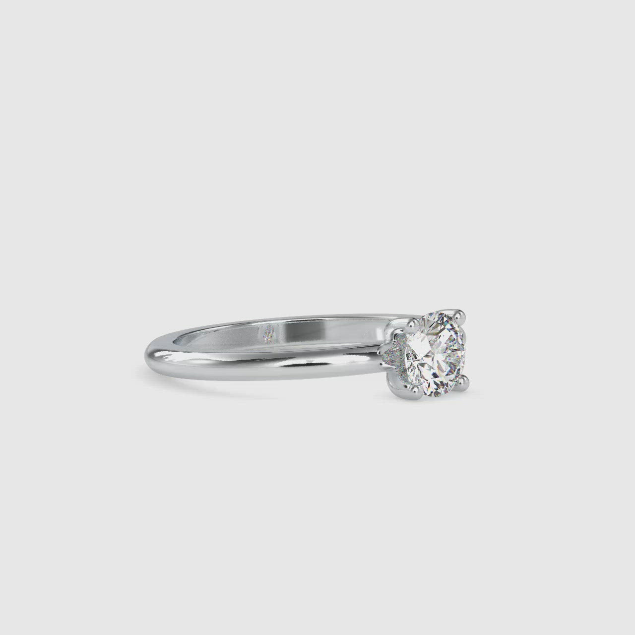 Stunning diamond solitaire ring round featuring a beautiful lab grown diamond.