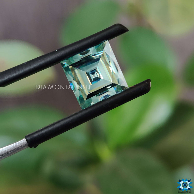 Aqua green moissanite chosen for its unique color.