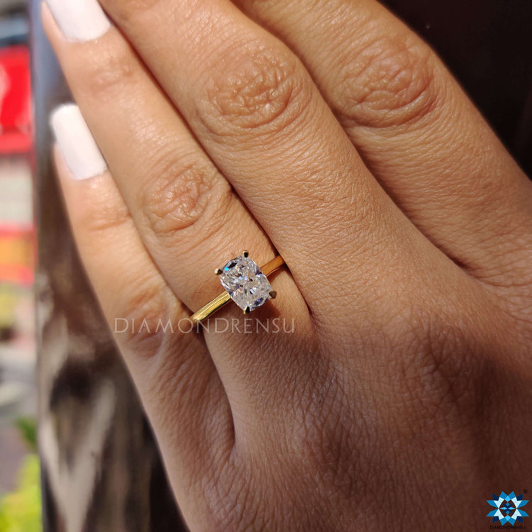 Elongated cushion cut moissanite sparkling with brilliance.