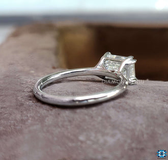 Moissanite emerald cut ring for a modern bride with a classic touch.
