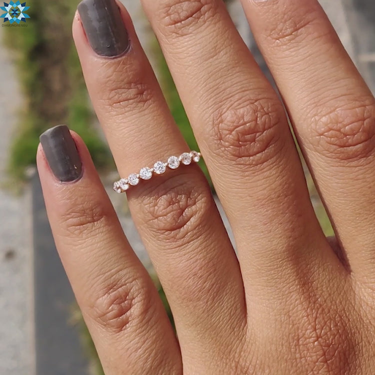 Band moissanite featuring a modern and elegant design.