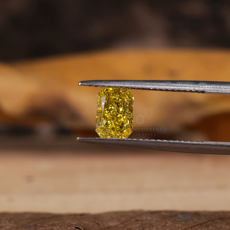 Yellow diamond 1.2 carat radiant cut diamond.

