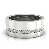 Channel set diamond band featuring round diamonds in gold.
