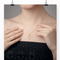 The cushion cut pendant offers a timeless, elegant design.
