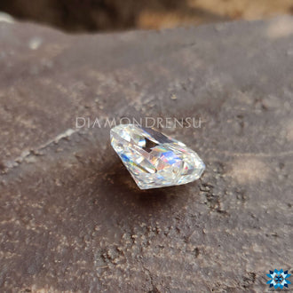 Cushion cut stone in clear moissanite quality.

