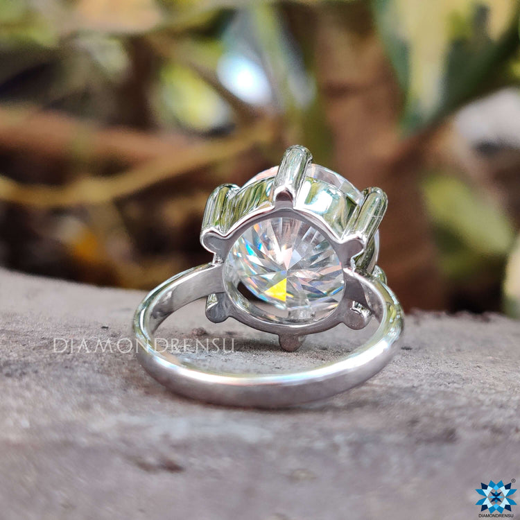 Round moissanite engagement ring with stunning clarity.
