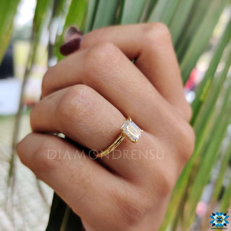 Handmade ring showcasing a flawless emerald step cut design.
