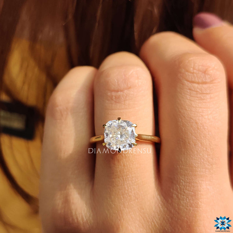 Beautiful cushion engagement ring with a sparkling centrepiece for a perfect promise.
