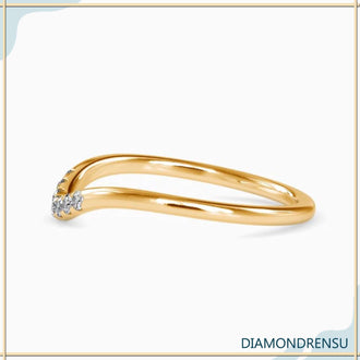 Handmade band with lab grown diamonds, rose gold, and a sleek curve
