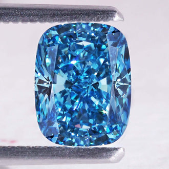 Blue cushion cut diamond shown as a 2.5 carat IGI certified lab grown stone.
