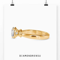 Beautiful diamond solitaire ring round with intricate infinity details.