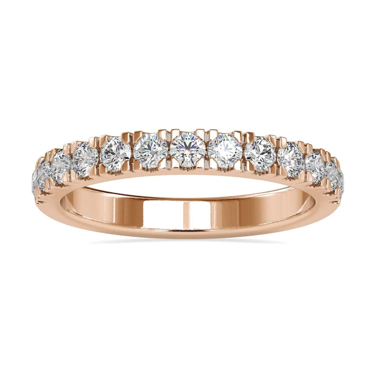 Diamond wedding band with round cut diamonds in a white gold setting.
