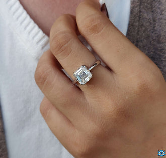 Asscher cut solitaire ring set in a sleek and modern design.
