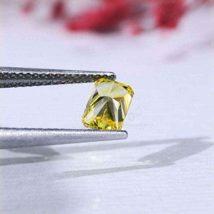 Loose radiant cut lab grown yellow diamond.
