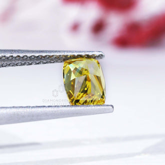 Elongated cushion cut loose diamond yellow lab grown.

