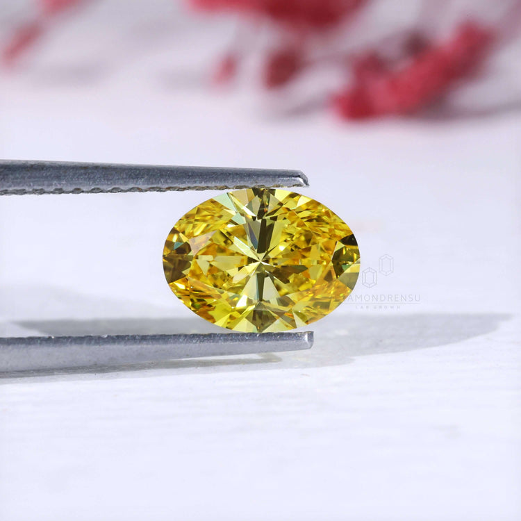 Loose yellow oval cut diamond lab grown.
