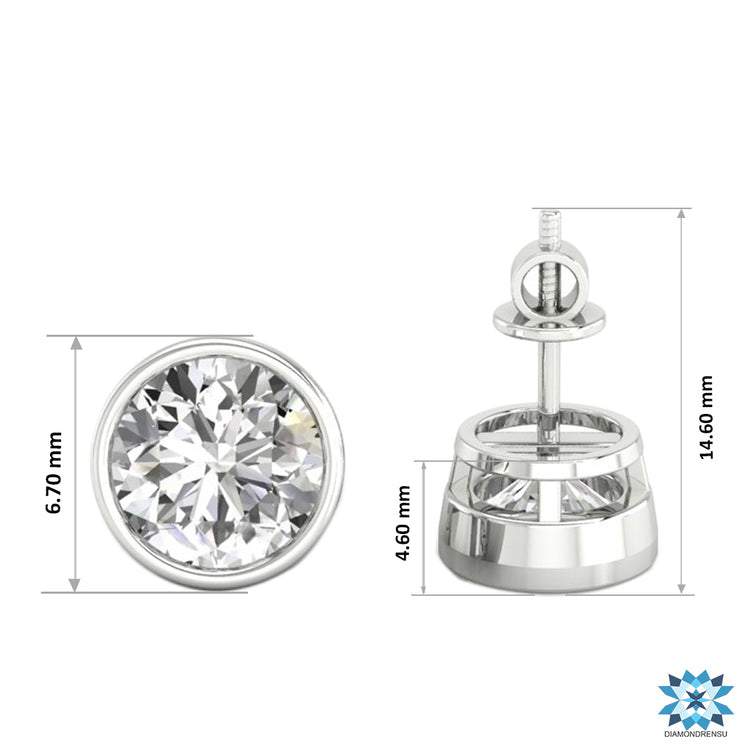 Stunning bezel set diamond studs, offering a modern twist on classic diamond earrings.
