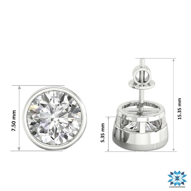 Dazzling simple silver earrings with round bezel diamond design for understated elegance.
