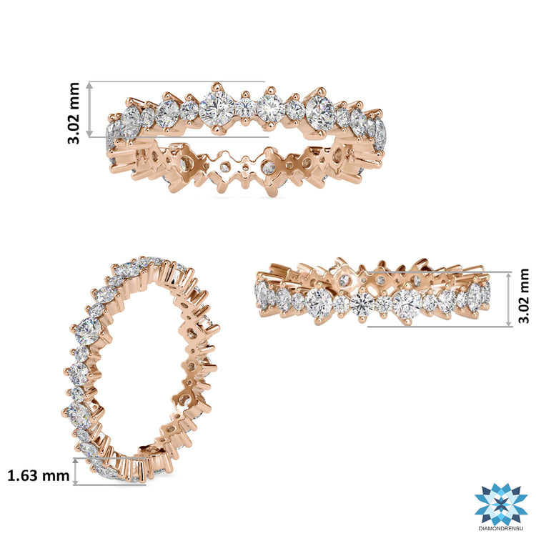 Rose gold wedding band for women with brilliant cut diamonds and a bubble floating band design.
