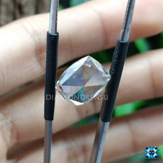 Cushion Moissanite displayed as a single loose stone from Diamondresnu.

