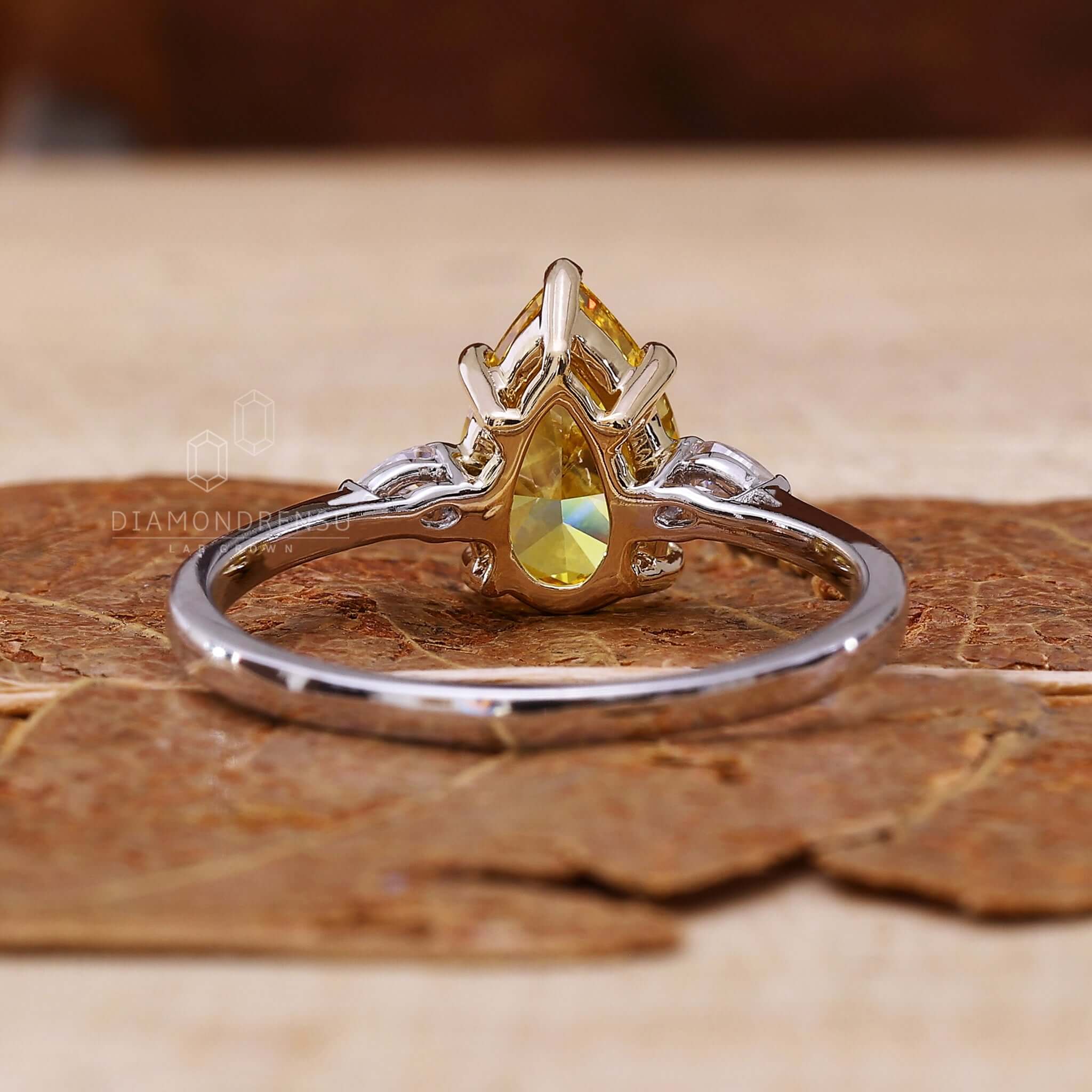 yellow pear diamond ring