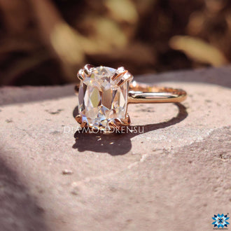 Cushion cut moissanite engagement ring crafted with elegance and beauty.

