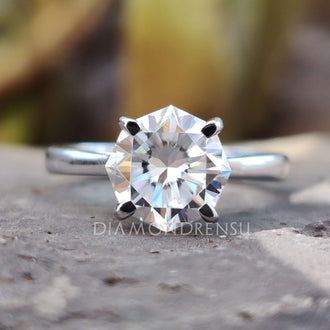 Octagon engagement ring featuring a bold geometric design with Hidden Infinity details.
