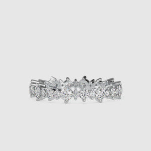 White gold eternity band with round cut diamond and shared prong 
design for women.