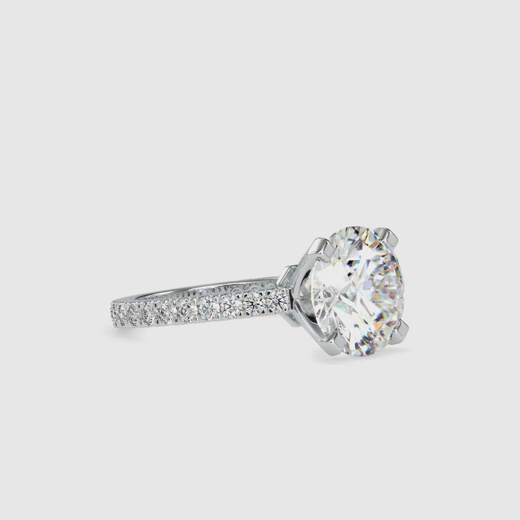 2 carat round cut diamond ring in a classic pave diamond ring setting.

