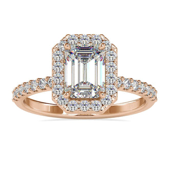 Emerald Halo Engagement Ring with a diamond halo design.