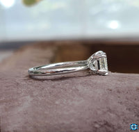 Moissanite engagement ring emerald cut, perfect for a sustainable and chic proposal.
