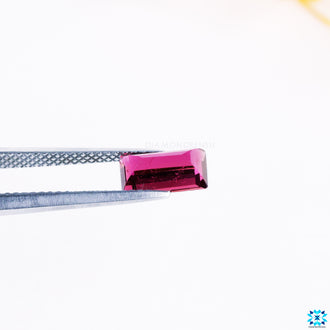 Natural tourmaline gemstone emerald cut pink.
