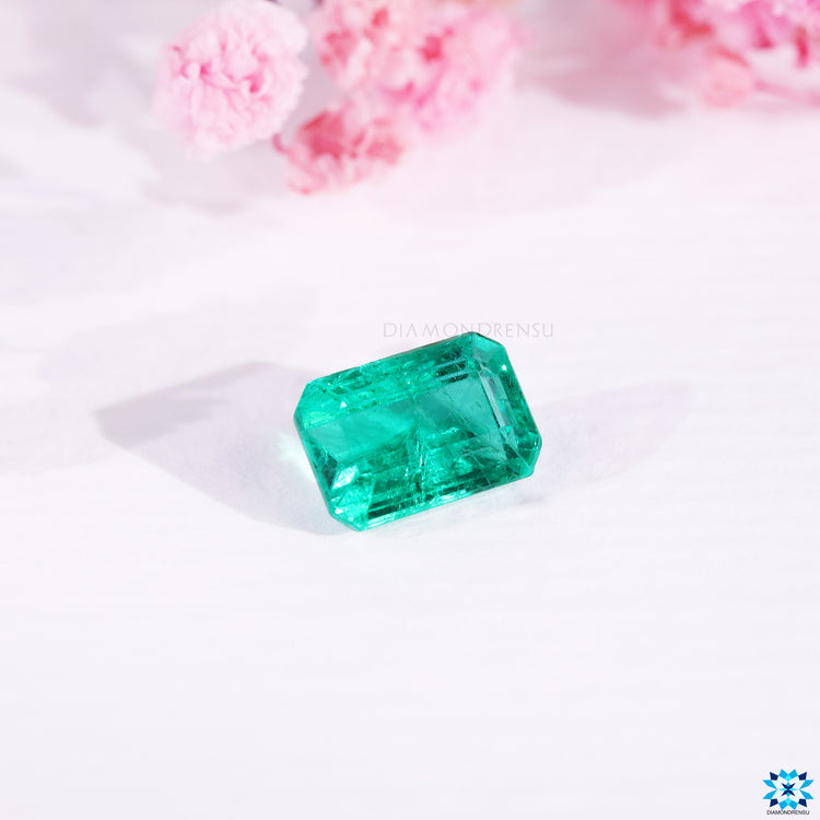 May birthstone emerald presented as emerald gemstone.
