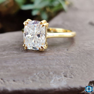 Unique cathedral setting solitaire with handcrafted beauty.