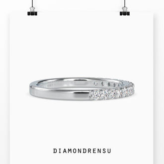 Round diamond half eternity wedding band with unique style.