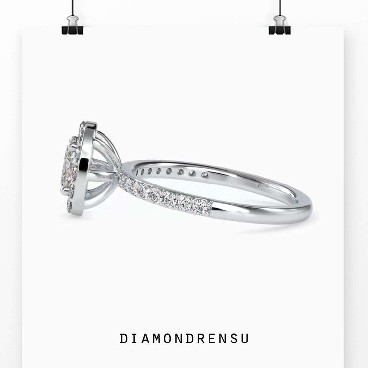 2 carat halo diamond ring featuring an oval diamond with halo and a pave band engagement ring.
