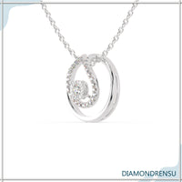 The gold round pendant provides a sleek, polished finish.
