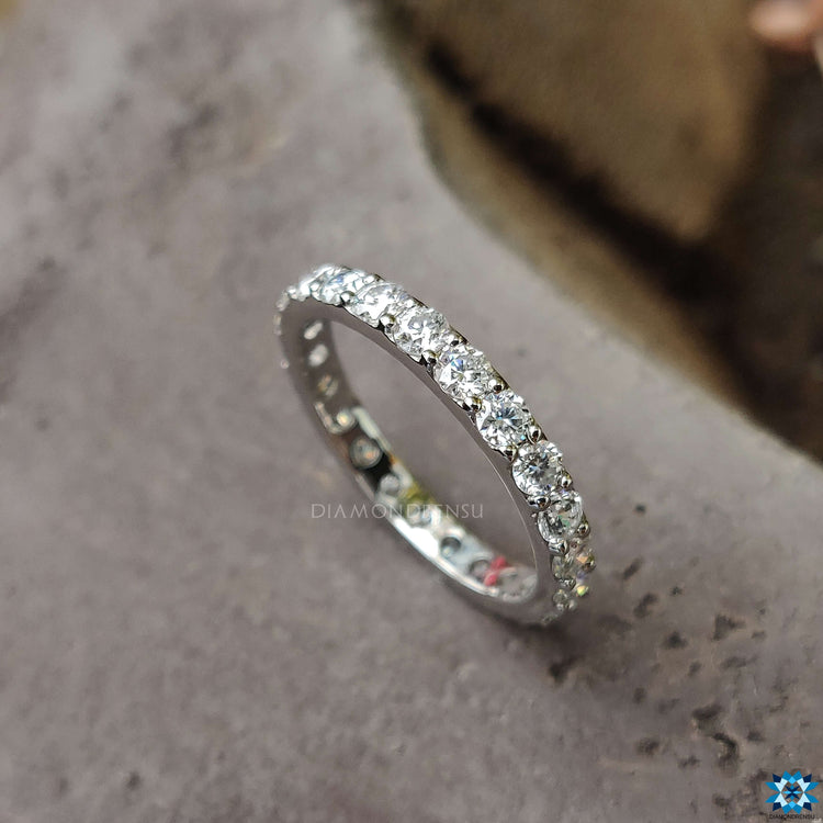 Round wedding band in sleek design for understated beauty.