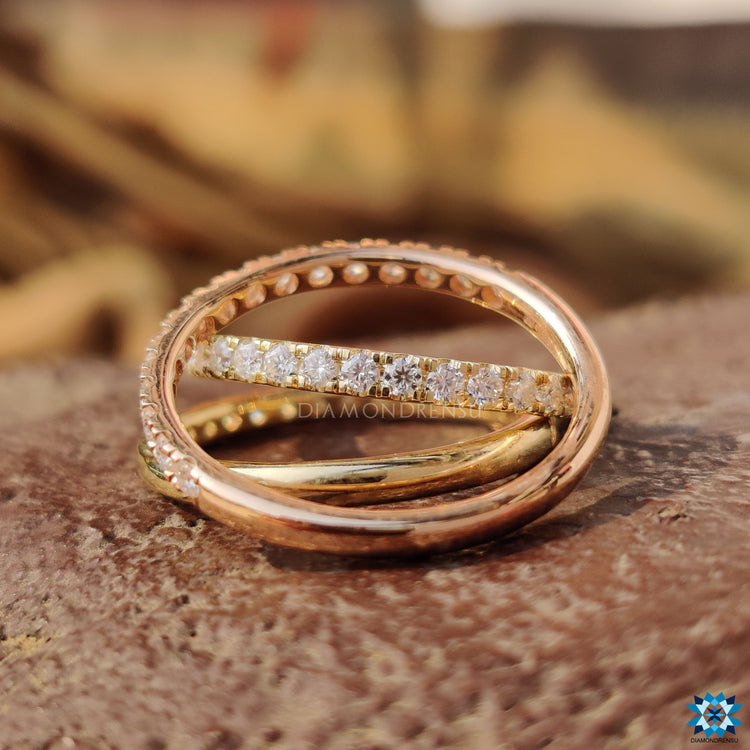 Handmade band with round brilliant cut moissanite stones.