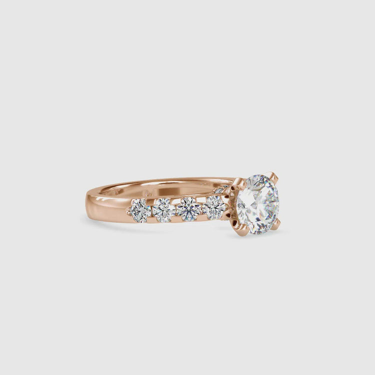 Elegant round cut engagement rings with lab grown diamond and pave accents.
