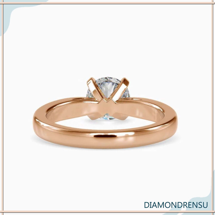 1 carat solitaire diamond ring in rose gold with prong tab setting
