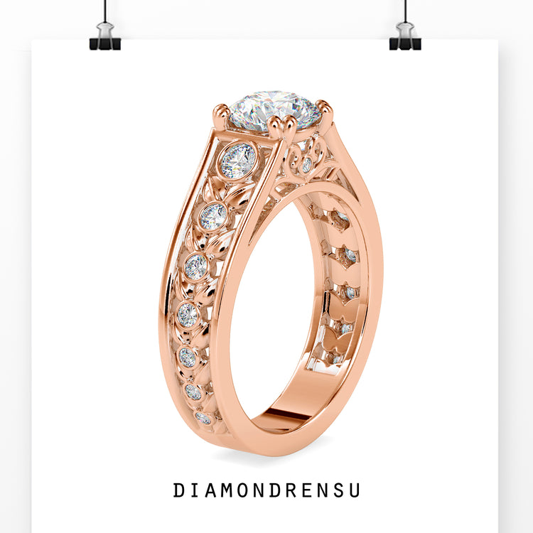 Filigree ring diamond with a bezel set and peekaboo engagement design.
