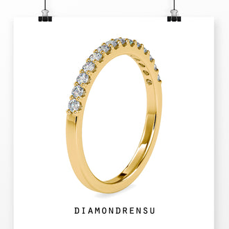 Diamond half eternity band in rose gold with brilliant cut diamonds.
