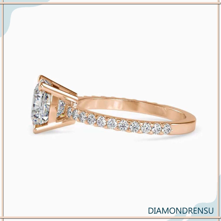 Lab grown diamond cushion cut engagement ring with pave setting.
