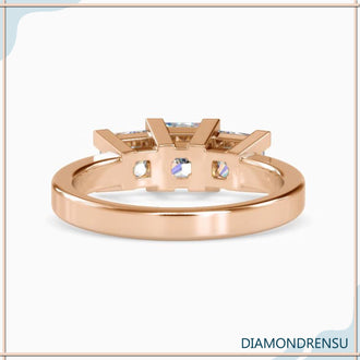 Handmade three stone emerald cut diamond ring in a white gold band