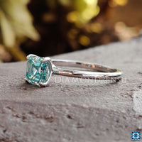 Vibrant cyan blue moissanite ring for a bold statement.