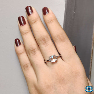 Round solitaire engagement ring exuding classic elegance.
