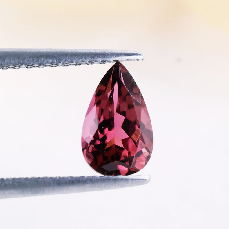 Tourmaline gemstone pink pear cut gemstone.
